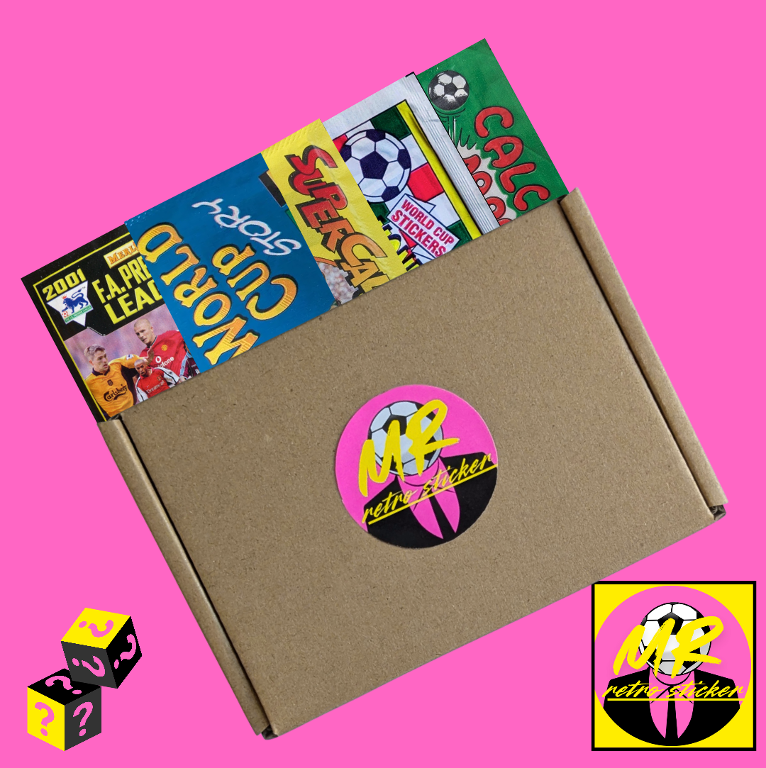 Collection of vintage soccer stickers in a cardboard box with a pink background